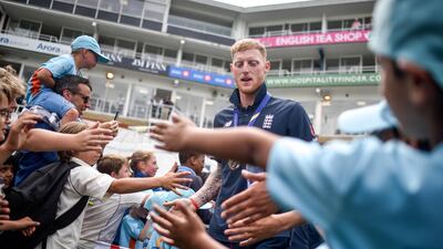 Johnny Bairstow high fives school children during the England ICC World Cup Victory Celebration at The Kia Oval in London, England. Getty Images