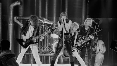 Def Leppard performing at the Channel 4 Christmas Show, UK, December 12, 1983: Rick Savage, Joe Elliott, Rick Allen, obscured), Phil Collen and Steve Clark. Getty Images