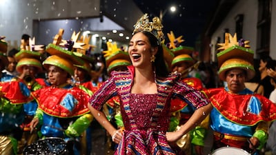 Revellers in Cali, Colombia, take part in a parade celebrating Biodiversity Week, which brings together leaders from Latin America and the Caribbean to propose solutions to the region's environmental challenges. EPA