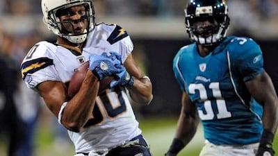 San Diego Chargers wide receiver Malcom Floyd (80) pulls in a 52-yard touchdown reception in front of Jacksonville Jaguars cornerback Ashton Youboty (31) during the third quarter of an NFL football game Monday, Dec. 5, 2011, in Jacksonville, Fla. (AP Photo/Stephen Morton) *** Local Caption *** Chargers Jaguars Football.JPEG-0f23b.jpg