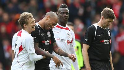 Lucas Leiva and Mario Balotelli with Thierry Henry and Steven Gerrard. Alex Morton / Reuters