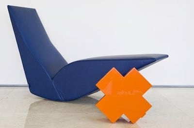 Thomas Eriksson's medicine cupboard seen here with Tom Dixon's Bird chair, both of which have become design classics. Photo: Cappellini