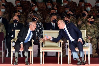 Lebanese Parliament Speaker Nabih Berri (left) talks to Lebanese Prime Minister Najib Mikati on Lebanon's Independence Day, in Yarzeh, near Beirut, Lebanon, on November 22, 2021. EPA