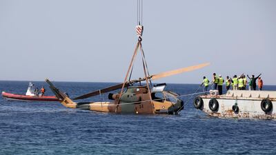 A helicopter being lowered into the Red Sea. Reuters