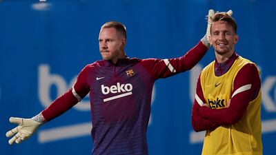 Barcelona goalkeeper Marc-Andre Ter Stegen and striker Luuk de Jong attend a training session. EPA