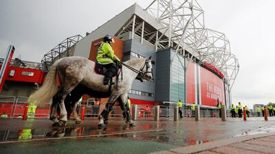 Police officers outside Old Trafford on Thursday. Reuters