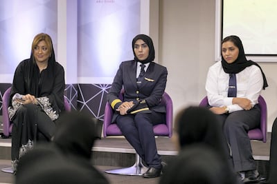 Salma al Baloushi, centre, Etihad’s first woman pilot, and Mariam Al Obaidli, right, technical engineer. Reem Mohammed / The National