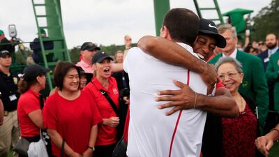 Tiger Woods celebrates with family after winning the Masters and the 15th major title of his illustrious career. Tannen Maury / EPA