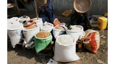 Somali women sell stolen food aid at a market in Mogadishu.