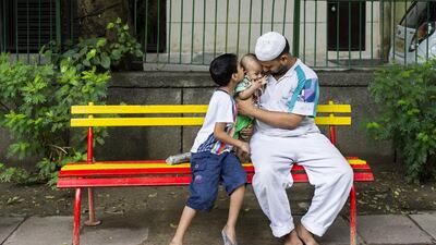 Kamaal goes on an outing at a local park with six-month-old Ibrahim and seven-year-old Ayaan.