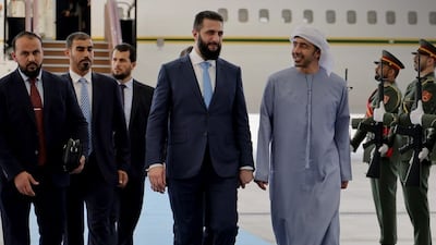 Syrian President Ahmad Al Shara, left, with Sheikh Abdullah bin Zayed, Deputy Prime Minister and Minister of Foreign Affairs, in Abu Dhabi. Photo: Sana / X