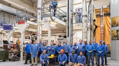 Engineers take a photo in front of the sounding rockets for the Atmospheric Perturbations around Eclipse Path (APEP) mission. Photo: Nasa