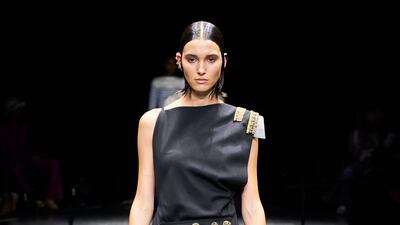 Maritime flourishes appeared at the Jean Paul Gaultier show, such as the naval buttoning on this dress.