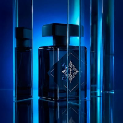 The electric blue and vibrant orange bottles reflect the collection’s dual emotional frequencies. Photo: Initio
