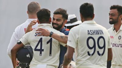 India's Ravichandran Ashwin, Shreyas Iyer and Virat Kohli celebrate their victory over Bangladesh in the second Test on Sunday. AP