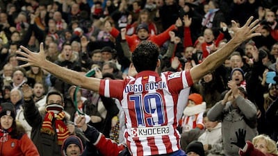 Diego Costa celebrates after scoring a goal on Sunday. Juanjo Martin / EPA