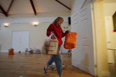 A volunteer prepares food parcels to be delivered on October 29, 2020 in London, England. Getty Images
