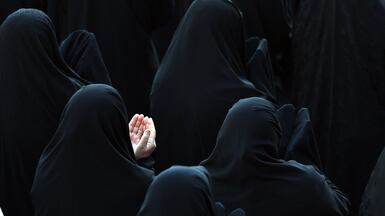 Women take part in prayers for rain at Saleh Shrine, in the north of Tehran. Worshippers prayed for rainfall in cities across the country as Iran is facing a drought. EPA