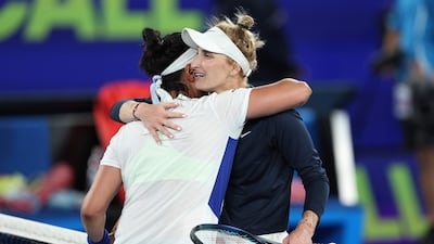 Marketa Vondrousova hugs Ons Jabeur after her win. AFP