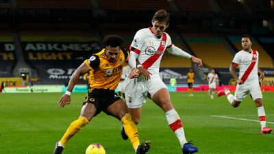 Wolves winger Adama Traore (left) and Southampton's Jannik Vestergaard battle for the ball. PA