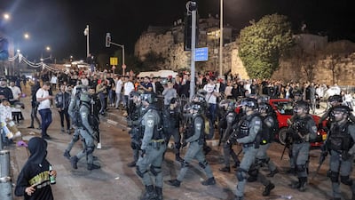 Dozens of people were wounded as Palestinians clashed with Israeli police on Sunday. AFP