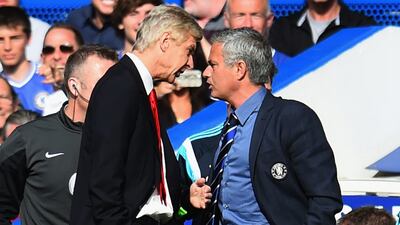 Arsene Wenger and Jose Mourinho shown having a heated exchange during a Premier League match between Arsenal and Chelsea last season. Shaun Botterill / Getty Images / October 4, 2014