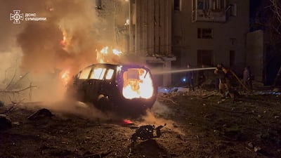 A building set alight in the Sumy region by a Russian drone attack that killed four on Sunday. AFP