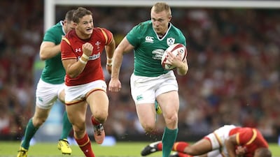 Keith Earls of Ireland breaks with the ball to score a try during a friendly against Wales at the Millennium Stadium in Cardiff on Saturday. David Rogers / Getty Images