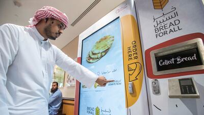 A man makes a donation to support the charitable campaign.