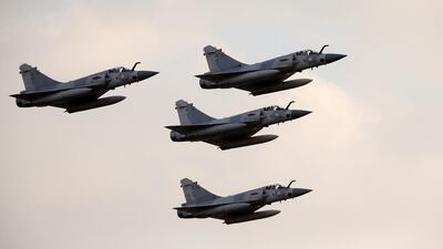 UAE jets fly over Abu Dhabi.