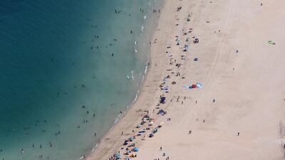 The beach at Jumeirah, which is among numerous coastal sights in Dubai. By 2020, the city is expected to welcome 20 million tourists a year, rising to 25 million throughout Expo 2020. Pawan Singh / The National