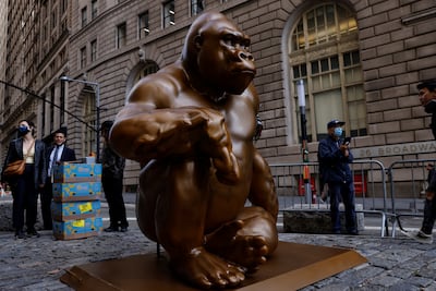 A temporary statue of Harambe in front of Wall Street's Charging Bull in 2021, meant to represent wealth disparity. Reuters