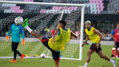 Raphinha attempts to control the ball during a Barcelona training session at the DRV PNK Stadium. EPA