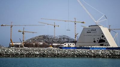 The outer walls of most of the galleries are now almost complete, and while a forest of temporary towers that support the dome until it is weight bearing partly obscure the museum’s interior, the effect, once limited to architects’ drawings, is becoming visible.
