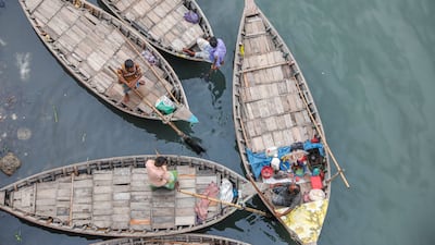 Boatmen at anchor in the Buriganga River in Dhaka, Bangladesh. EPA