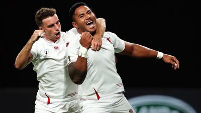 Manu Tuilagi, right, of England celebrates scoring his side's second try with his team mate George Ford during the Rugby World Cup 2019 Group C game between England and Tonga at the Sapporo Dome in Hokkaido, Japan. Getty Images
