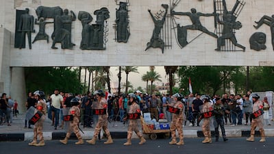 Iraqi security forces close Tahrir Square while protesters gather demanding services and jobs in central Baghdad. AP Photo