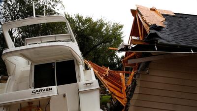 A boat sits in a backyard after the passing of Hurricane Florence in New Bern, North Carolina. Reuters