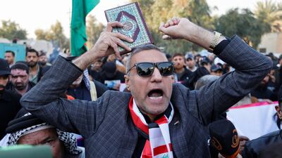 Iraqis demonstrate in Baghdad. Reuters