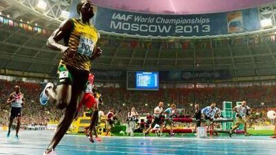 Lightning strikes in the sky after Jamaica's Usain Bolt wins the 100 metres final.