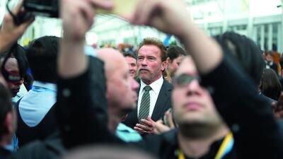 US actor and former California governor Arnold Schwarzenegger, leaves after a press conference as part of the COP21 UN conference on climate change, on December 8, 2015, in Le Bourget near Paris. Alain Jocard / Agence France-Presse