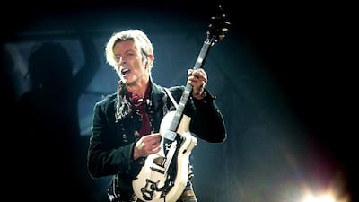 Rock legend David Bowie performs on stage at the Forum in Copenhagen late 07 October 2003. == DENMARK OUT ==AFP PHOTO NILS MEILVANG/SCANPIX NORDFOTO