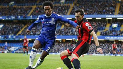 Chelsea midfielder Willian takes on Bournemouth’s Charlie Daniels. Peter Nicholls / Reuters