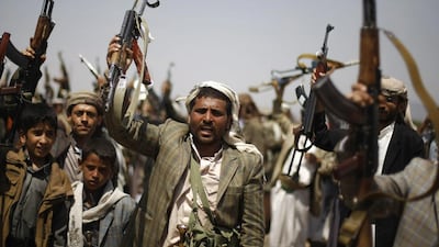 Yemeni tribesmen chant slogans during a tribal meeting to show their support for Gaza and anti-terror in Bani Al Harith area on the outskirts of Sanaa on August 17. Hani Mohammed / AP Photo