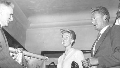 American film actress and singer Doris Day, shopping with Van Johnson in the Italian Riviera resort of San Remo in May 1955. Keystone / Getty Images