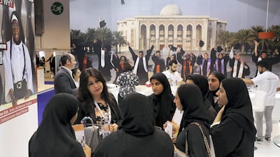 The American University of Sharjah stand was popular during the Najah education fair in Abu Dhabi. Pawan Singh / The National