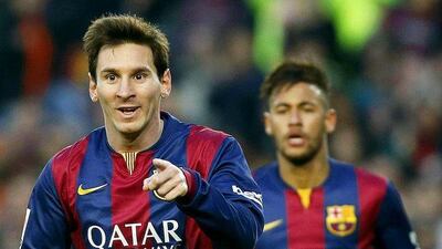Barcelona striker Lionel Messi, left, celebrates with his teammate Neymar after scoring during their Spanish Primera Liga match against Levante UD at Camp Nou in Barcelona, north-eastern Spain, 15 February 2015. EPA/ANDREU DALMAU