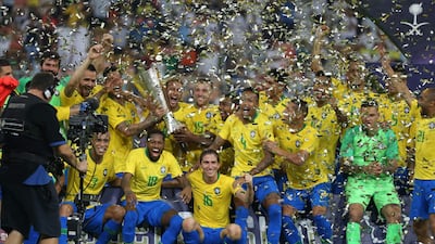 Brazil players celebrate with the trophy after winning the friendly tournament staged in Saudi Arabia. AFP