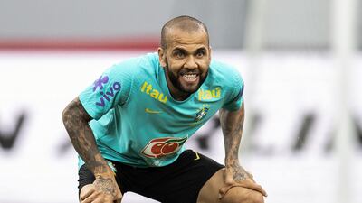 Dani Alves earns £35,000 a week at UNAM. AFP