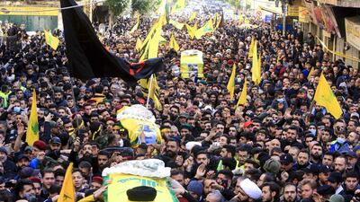 Supporters of Lebanon's Shiite Hezbollah movement carry coffins of the group's fighters killed in Syria, during their funeral procession in a suburb of the Lebanese capital Beirut. AFP